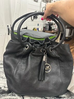 Michael Kors Black Leather Drawstring Shoulder Bag with Tassel Charm